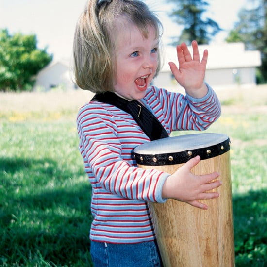 Child with Autism Playing Conga Drum